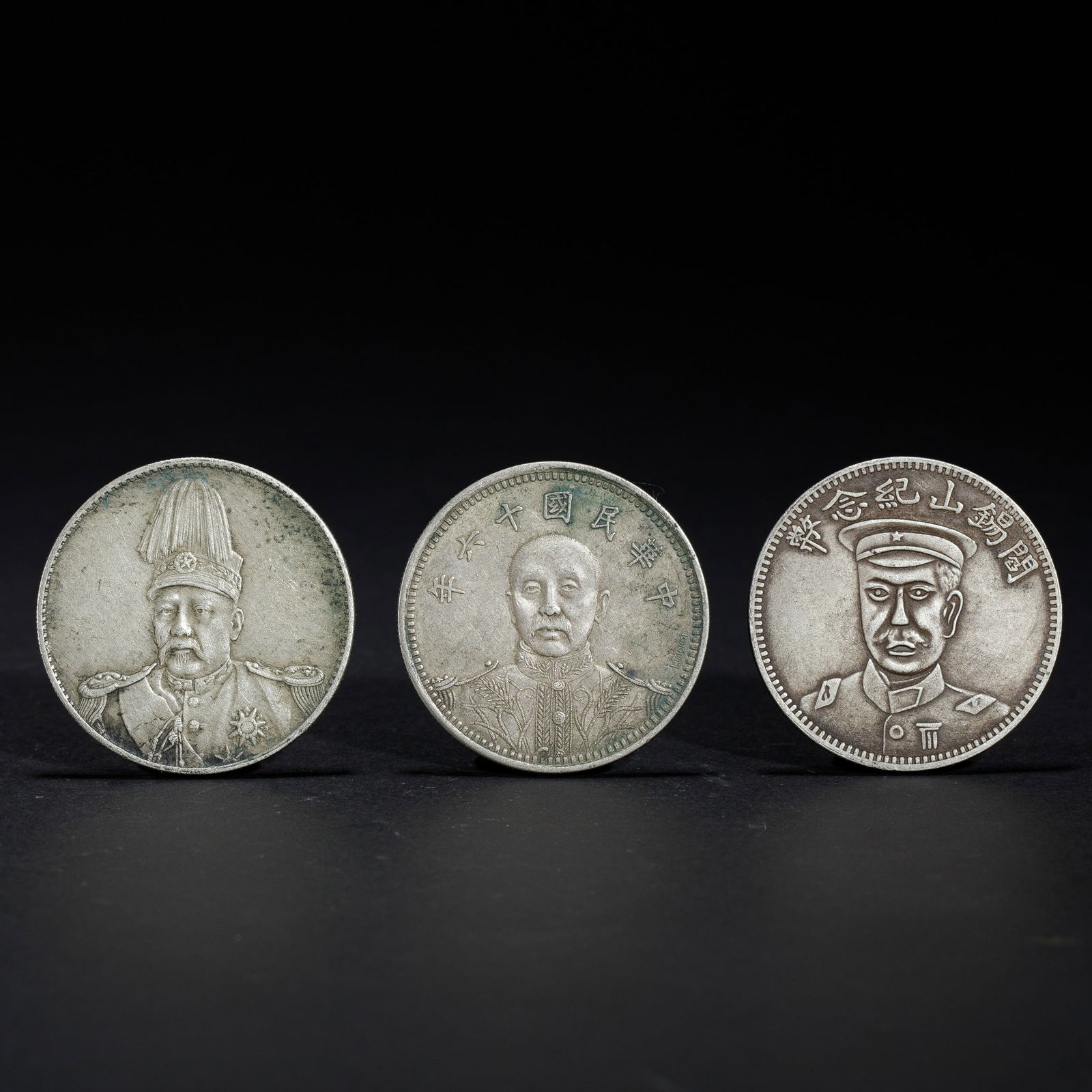 THREE CHINESE SILVER COINS (1 of 9)