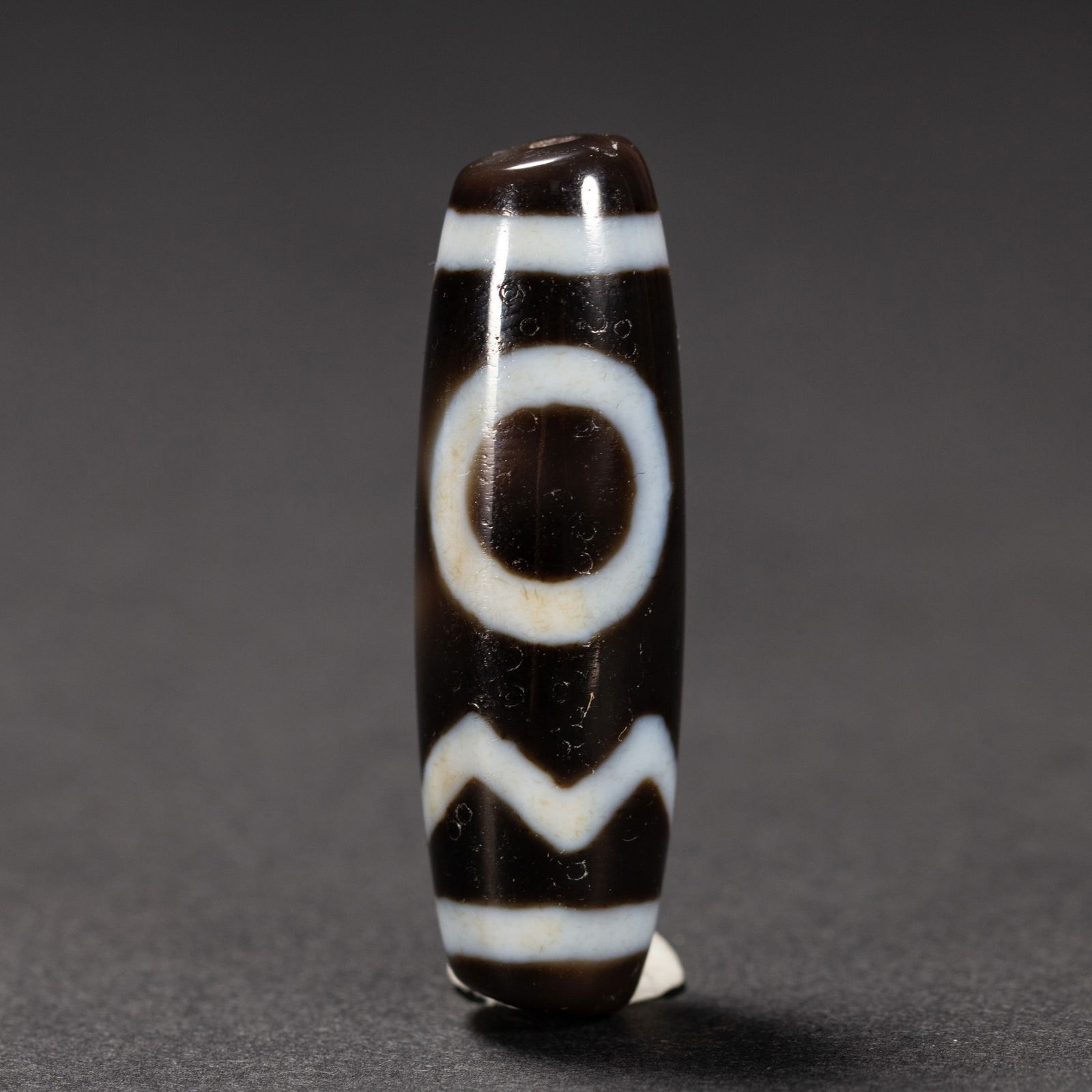 A TIBETAN DZI BEAD (1 of 6)