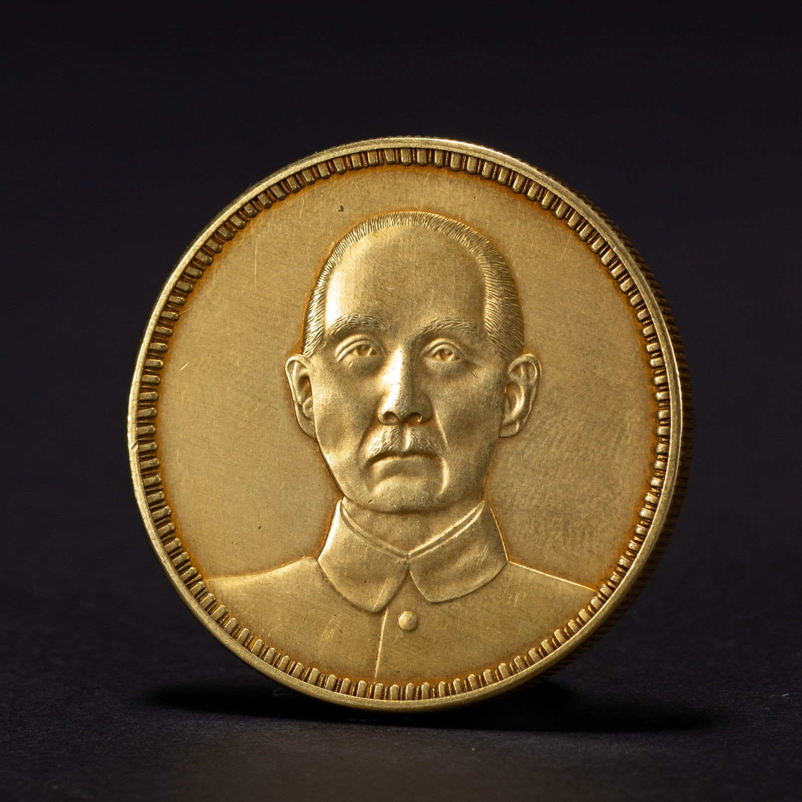 A SILVER-GILT COIN (1 of 6)