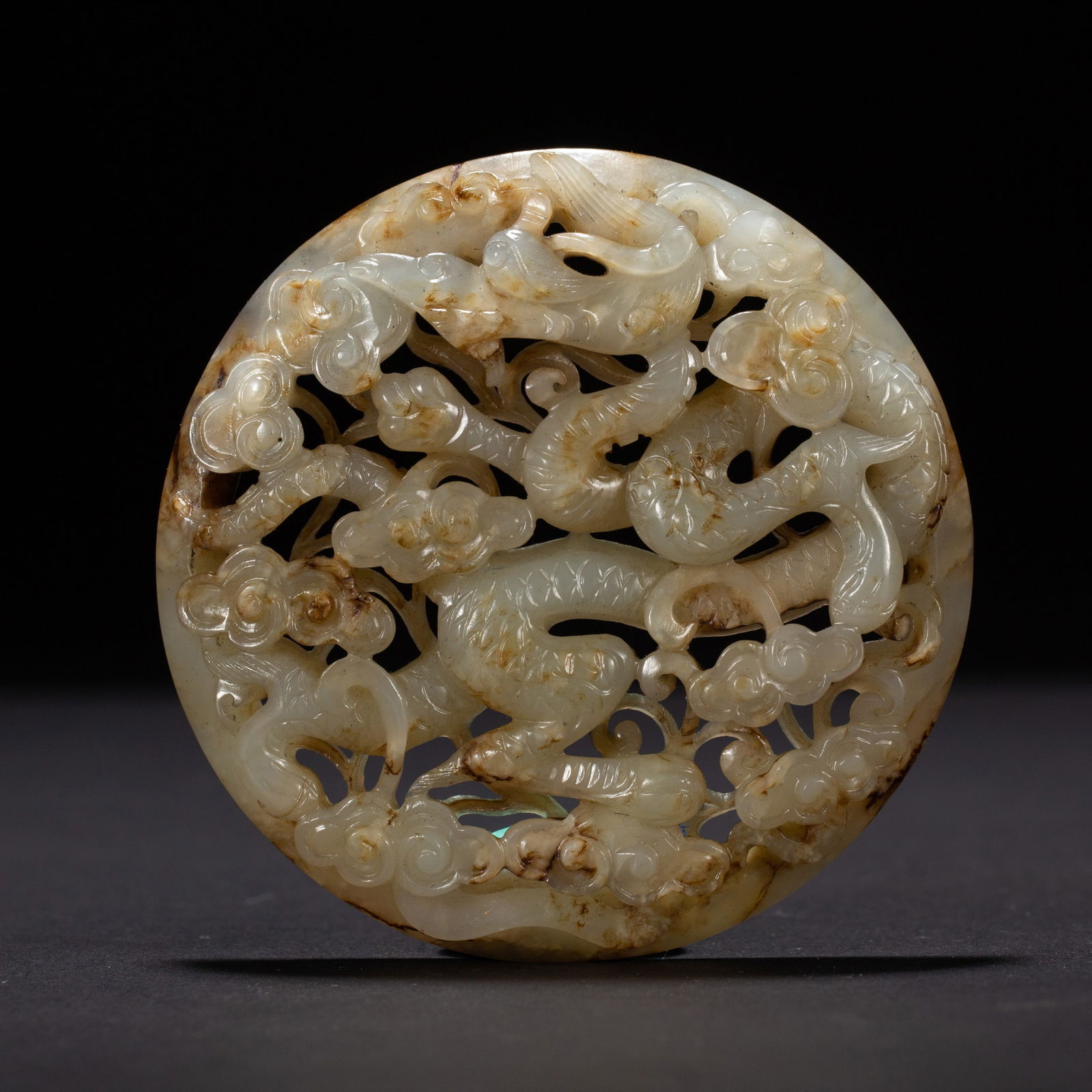 A CARVED JADE DRAGON PLAQUE (1 of 8)