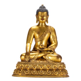 A GREAT BRONZE-GILT SEATED SHAKYAMUNI