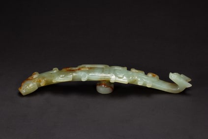 A CARVED WHITE JADE BELTHOOK