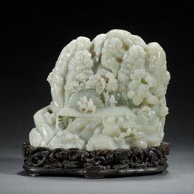 A CARVED WHITE JADE DECORATION