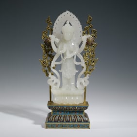 A FINE CARVED WHITE JADE BODHISATTV