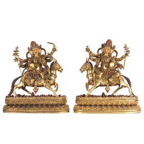 PAIR BRONZE-GILT SEATED PROTECTORS