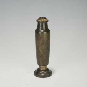 A BRONZE PARTLY GILT VASE