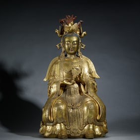 AN UNUSUAL LARGE GILT-BRONZE FIGURE OF BIXIA YUANJUN