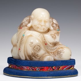 A HARDSTONES INLAID CARVED SHOUSHAN STONE LUOHAN