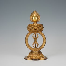 A BRONZE-GILT ALTER DECORATION