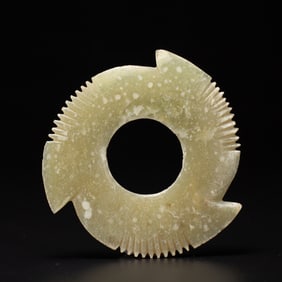 A CARVED JADE NOTCHED DISC YABI
