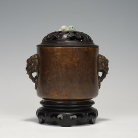 A BRONZE CENSER WITH HANDLES