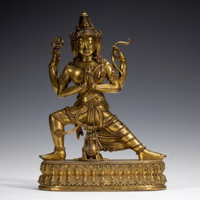A TIBETAN BRONZE-GILT STANDING TARA