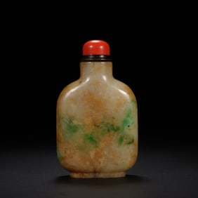 A CARVED JADEITE SNUFF BOTTLE