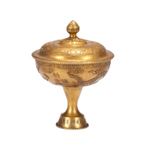 A BRONZE-GILT CUP WITH COVER