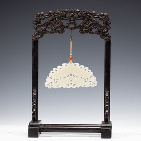A CARVED WHITE JADE FISH CHIME PENDANT