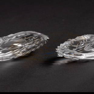 A CARVED ROCK CRYSTAL CICADA: A CARVED ROCK CRYSTAL CICADA Naturalistically carved to imitate a cicada, the stone is of transparent pale tone with natural inclusions. DIMENSIONS: L. 6 cm. W. 2 cm. H. 2 cm. Weight 30 grams. HAVE A