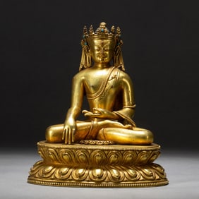 AN IMPORTANT BRONZE-GILT SEATED CROWN BUDDHA