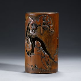 A CARVED WOODEN FIGURAL STORY BRUSHPOT