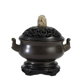 A BRONZE CENSER WITH COVER