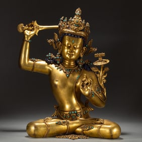 A TURQUOISE INLAID BRONZE-GILT SEATED MANJUSRI