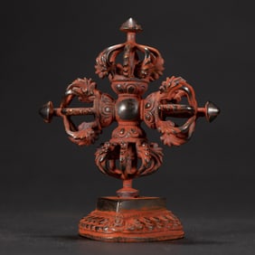 A TIBETAN BRONZE CROSS VAJRA