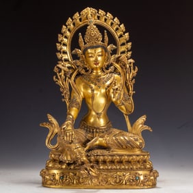 AN IMPORTANT BRONZE-GILT SEATED BODHISATTVA