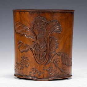 A CARVED HUANGHUALI BRUSHPOT