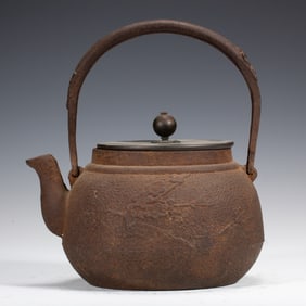 A JAPANESE IRON TEAPOT
