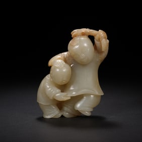 A CARVED JADE BOYS GROUP