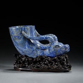 A CARVED LAPIS RHYTON