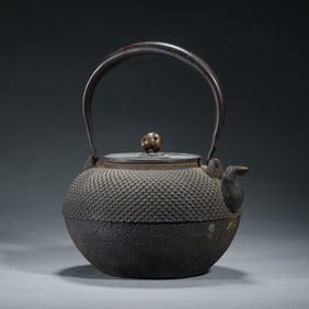 A JAPANESE BRONZE TEAPOT