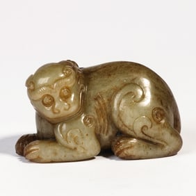 A CARVED JADE MYTHICAL BEAST