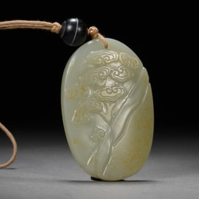 A CARVED WHITE JADE LINGZHI PLAQUE