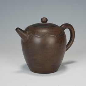 A YIXING GLAZE ZISHA TEAPOT