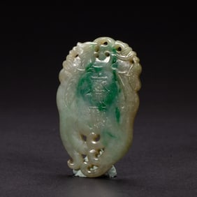 A CARVED JADEITE ABSTINENCE PLAQUE