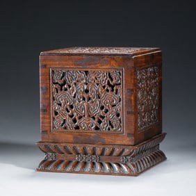 A CARVED HARDWOOD HUANGHUALI BOX WITH COVER