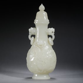 A FINE CARVED WHITE JADE DRAGON VASE