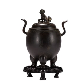 A BRONZE TRIPOD INCENSE BURNER WITH COVER
