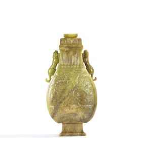 A FINE CARVED YELLOW JADE DRAGON VASES WITH COVER
