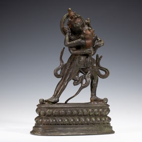A TIBETAN COPPER ALLOY STANDING MAHAKARA