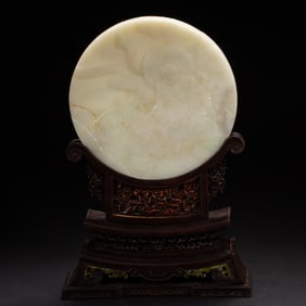 A CARVED WHITE JADE LUOHAN TABLE SCREEN