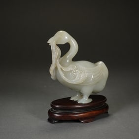 A CARVED JADE GOOSE