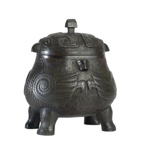 A VERY RARE AND EXCEPTIONAL BRONZE RITUAL OWL-FORM WINE VESSEL, XIAO YOU