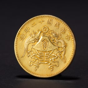 A SILVER-GILT COIN