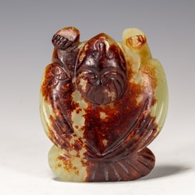 A CARVED JADE GARUDA