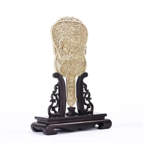 A FINE CARVED JADE FIGURAL STORY FAN