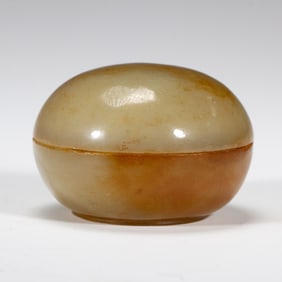 A JADE CIRCULAR BOX WITH COVER