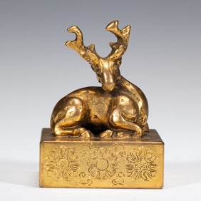 A BRONZE-GILT DEER SEAL
