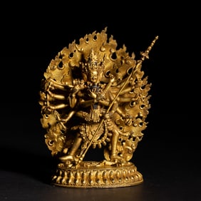 A rare BRONZE-GILT FIGURE OF CAKRASAMVARA