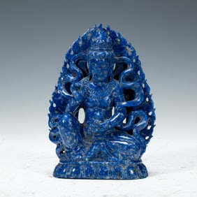 A CARVED LAPIS BODHISATTVA